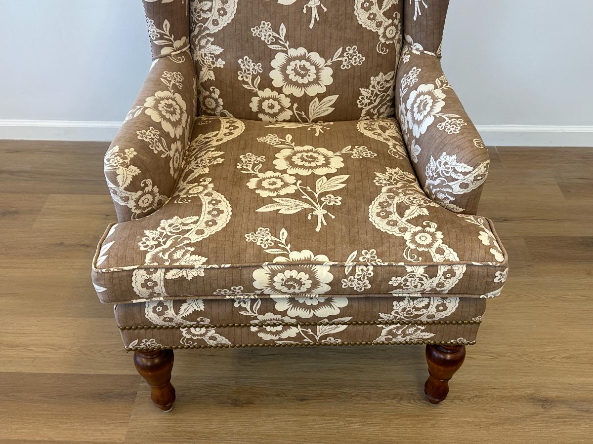 Wing Chair in Brown and White Floral Fabric and Nailhead Detail