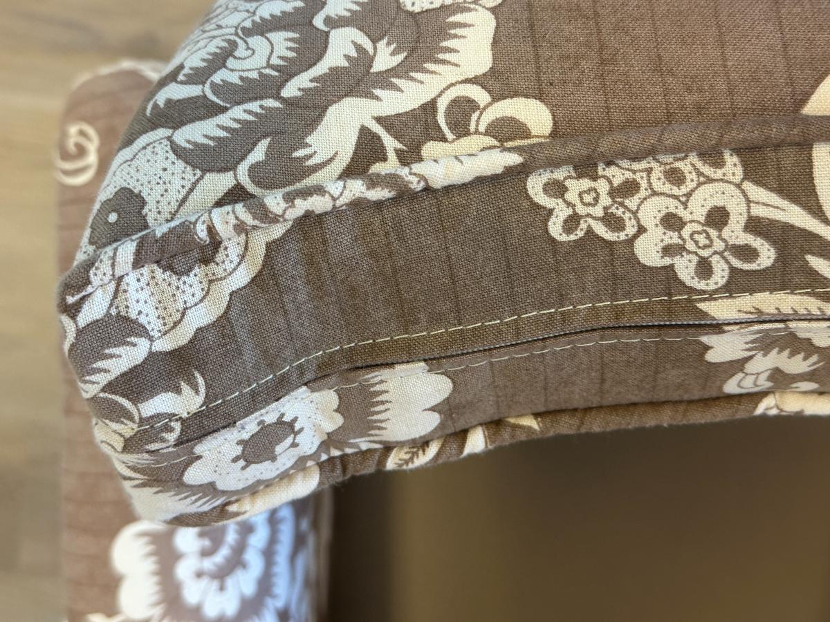 Wing Chair in Brown and White Floral Fabric and Nailhead Detail