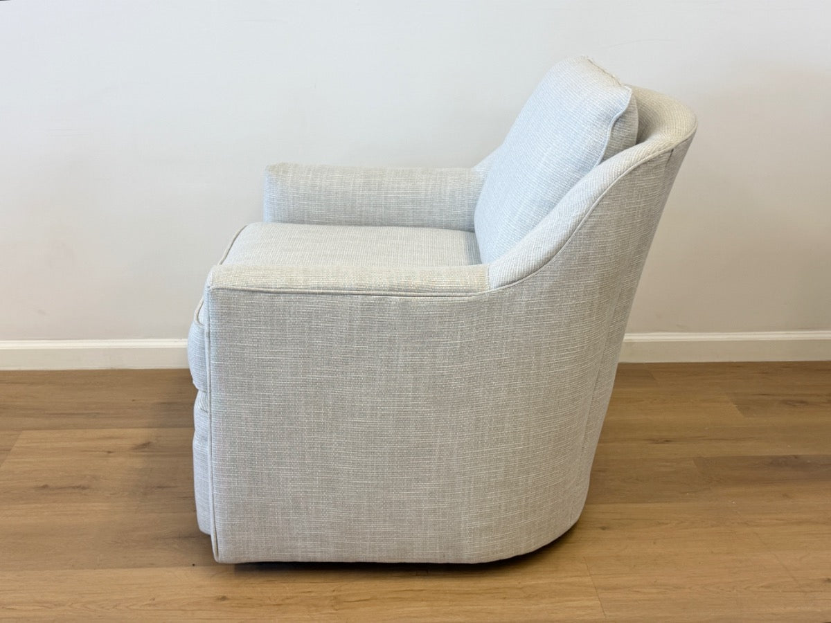 Custom Upholstered Swivel Chair from Housewarmings