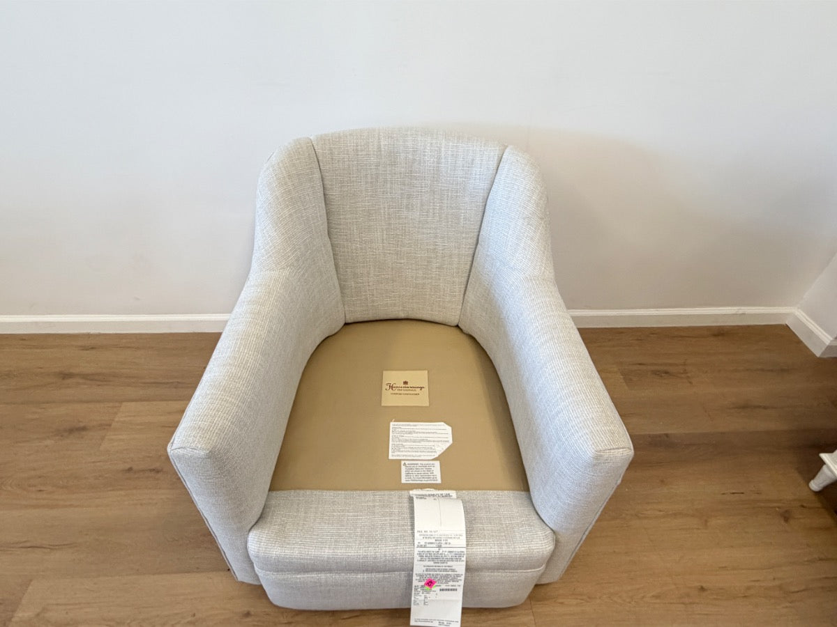 Custom Upholstered Swivel Chair from Housewarmings