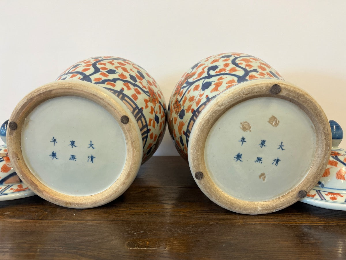 Japanese Imari Polychrome Covered Porcelain Urns, Pair
