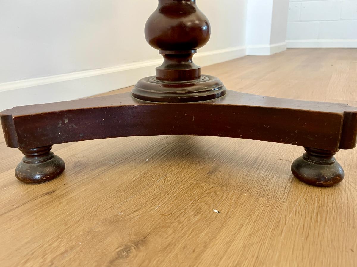 Carved Mahogany Round-Top Pedestal Table from Guild Antiques