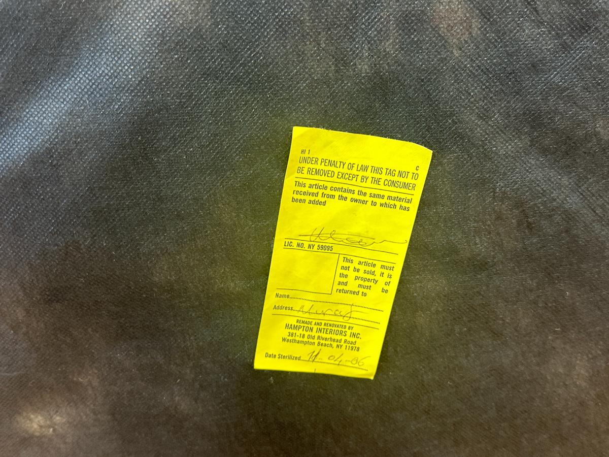 Wing Chair in Brown and White Floral Fabric and Nailhead Detail