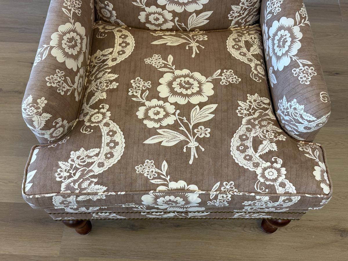 Wing Chair in Brown and White Floral Fabric and Nailhead Detail