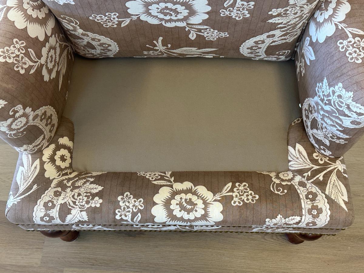 Wing Chair in Brown and White Floral Fabric and Nailhead Detail
