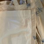 Lot #9 in the Town & Sea Timeless Blue and White Sale is a Blue Floral Embroidered Panels, Set of 4, Rods Included and is (2) 42"w x 88"l, 72"w Silver Rod, (2) 33"w x 88"h, 56"w Silver Rod, 38 rings included The condition of these Blue and White Window Treatments is Good condition Auction closes 7/6 at 8pm. Place your bids today!
