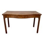 Shop lot # 3 the Antique Serpentine Front Console Table in the Town & Sea Southampton Estate Sale, the auction closes 9/27 at 8pm. This product is 56"w x 25"d x 36"h and its condition details are: Cracking in the frame as well as visible sun fading and light scratching, see photos. Place your bids on https://townandsea.com/sales/southampton-estate-sale/ today!