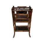 Shop lot # 25 the Burnt Bamboo Magazine Rack / Music Stand Table in the Town & Sea Southampton Estate Sale, the auction closes 9/27 at 8pm. This product is 8"w x 14"d x 29"h and its condition details are: Shows signs of light wear, see photos. Place your bids on https://townandsea.com/sales/southampton-estate-sale/ today!