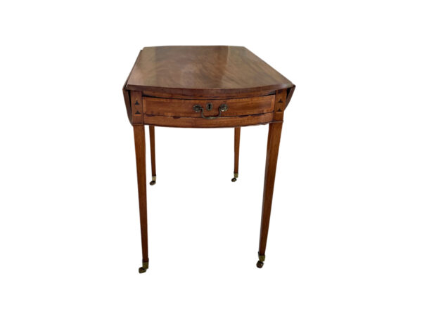 Shop lot # 39 the Single Drawer Mahogany Pembroke Table with Inlaid Urns in the Town & Sea Southampton Estate Sale, the auction closes 9/27 at 8pm. This product is 36"w x 30.5"d x 28"h, when leaves are down: 19"w x 30.5"d x 28"h, Has a fake drawer on the back of the table. and its condition details are: Small chips and scratches, see photos. Place your bids on https://townandsea.com/sales/southampton-estate-sale/ today!