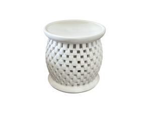 The Bamileke Stool in Chalk White is a white, round ceramic piece featuring a basketweave pattern and a flat top surface.