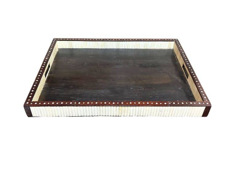 A square wooden tray with a dark brown surface and light-colored, ribbed sides.