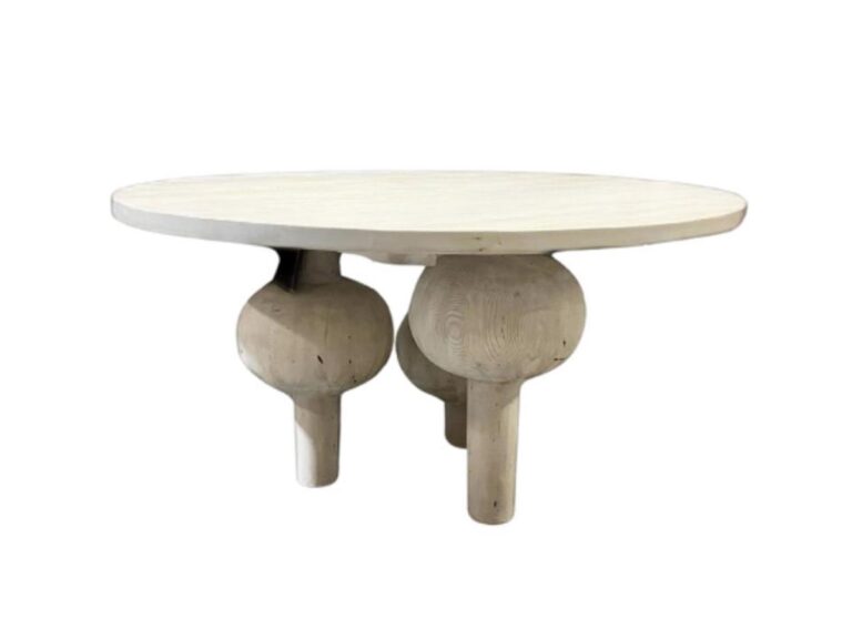 The Julie Reclaimed Solid Wood Round Dining Table from CFC showcases a distinctive design with three spherical and cylindrical legs.