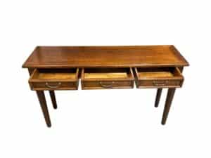 Three Drawer Wood Console Table featuring tapered legs and three open drawers, set against a white background.