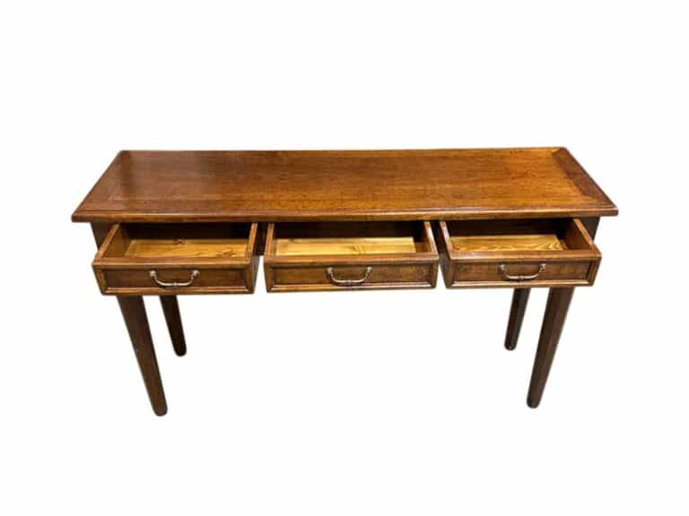 Three Drawer Wood Console Table featuring tapered legs and three open drawers, set against a white background.