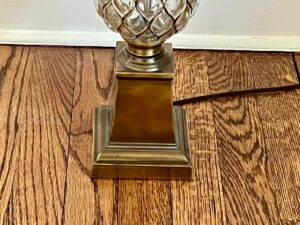 Vintage Pineapple Crystal & Brass Lamp on a wooden floor.
