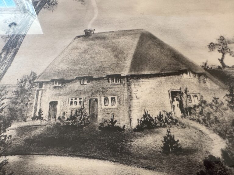 The Sussex House Etching, signed lower right, depicts a thatched-roof cottage enveloped by shrubbery with a person at the entrance.