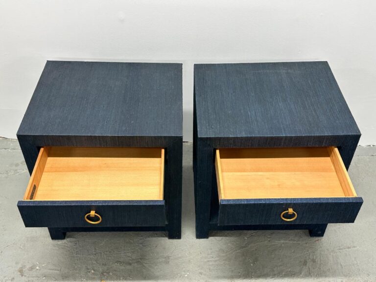A pair of Serena & Lily Driftway nightstands with open wooden drawers and gold ring handles sit on a gray floor.