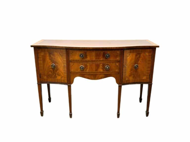 Vintage wooden sideboard with curved front, three drawers, and four tapered legs.