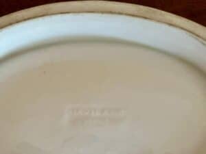 Close-up of a Haviland China plate backstamp showing the brand name.